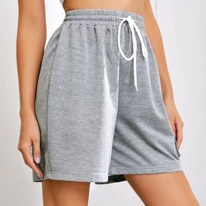side flap pocket drawstring waist track shorts
